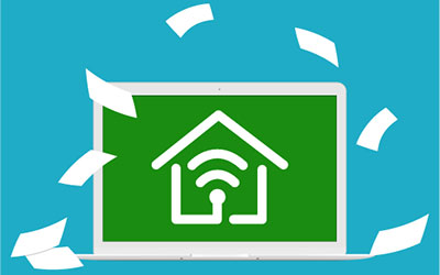 écran d'ordinateur avec un symbole de Wi-Fi dans une maison